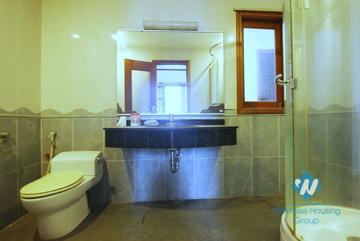 Unfurnished 4 bedrooms house with garage for rent in Xuan Dieu st, Tay Ho area.